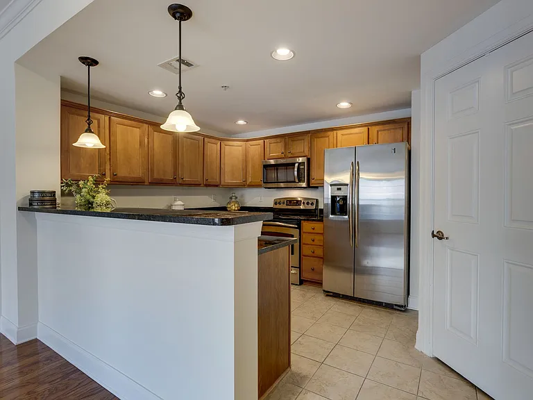 Cook's Kitchen with Eating bar, Granite, & stainless appliances, & lots of cabinet space