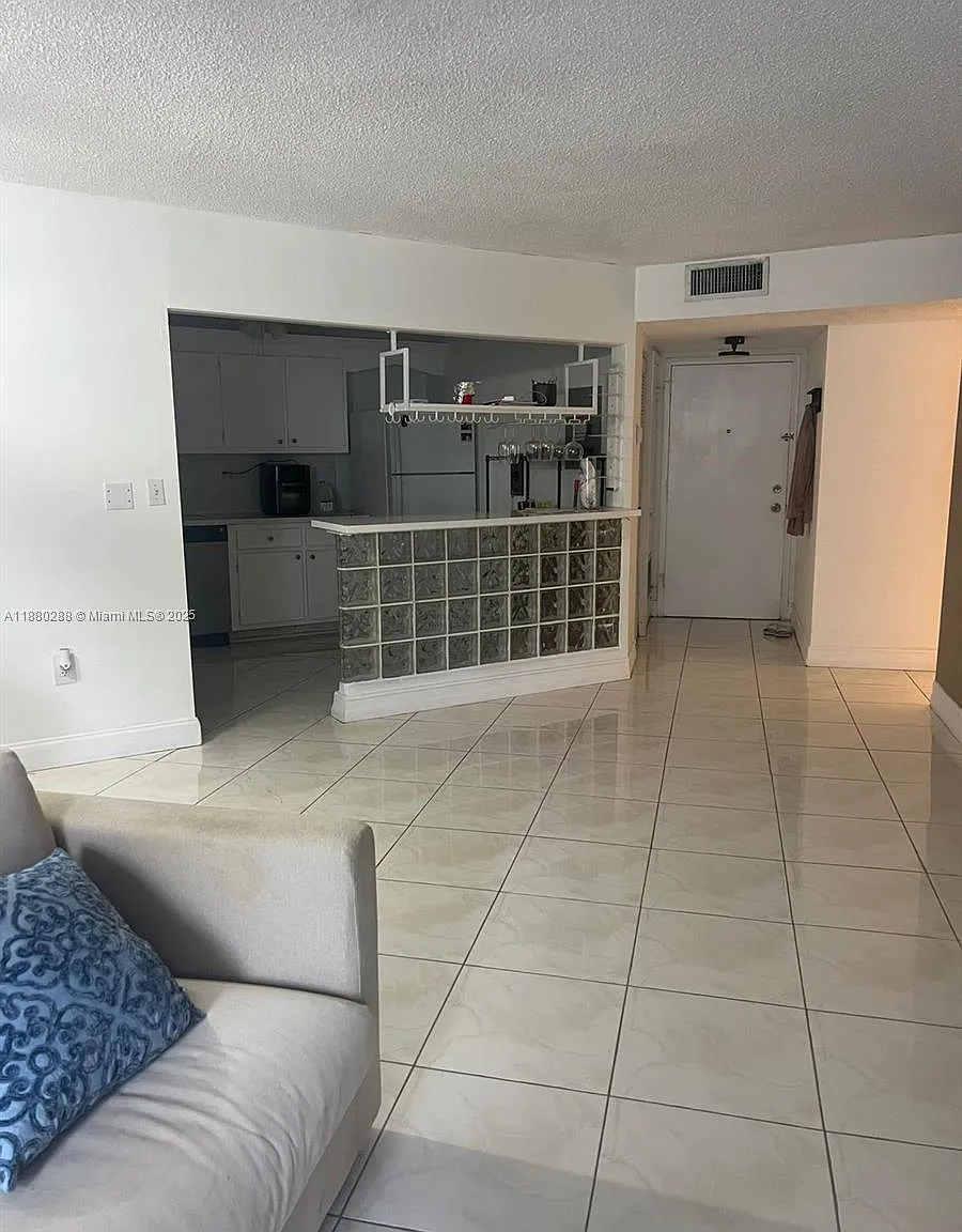 Commodore Plaza Condo — Photo 1