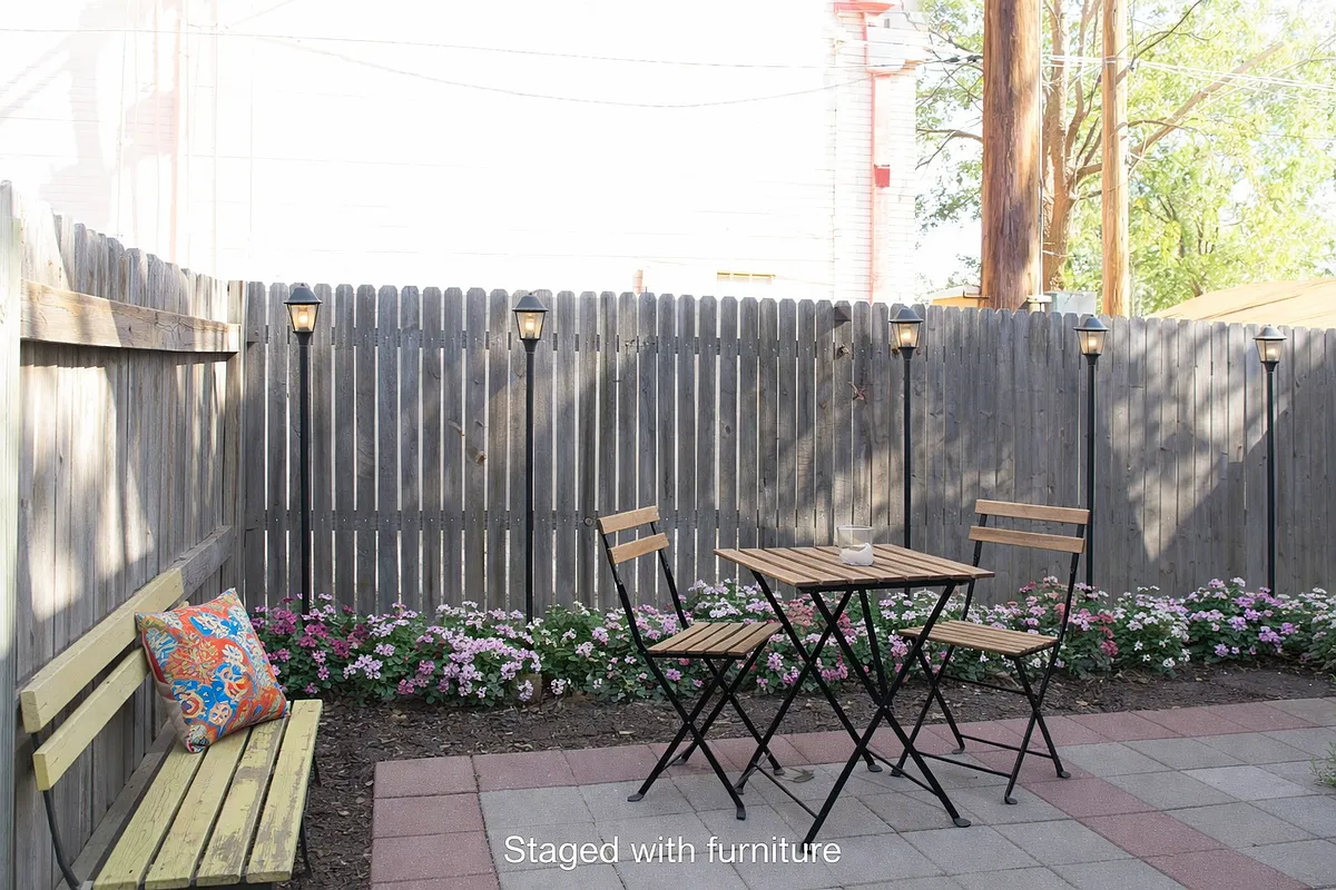 Tree shaded privacy fenced patio with room for outdoor living and dining - 2124 16th St #R