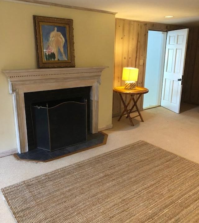 Handsome architectural fireplace surround.