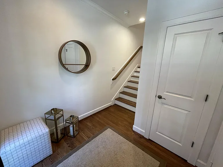 Front entrance with coat closet and access to the two car garage.