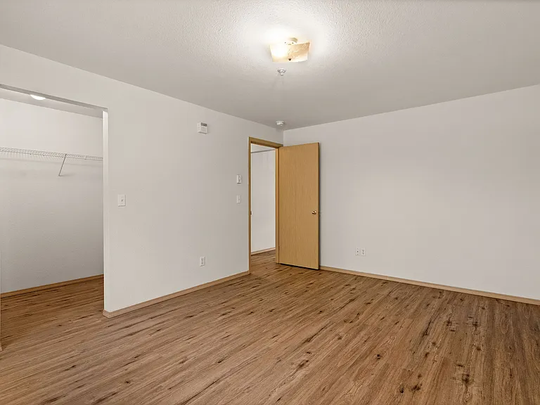 Explore this bright and spacious bedroom, complete with a walk-in closet for all your storage needs. Explore this bright and spacious bedroom, complete with a walk-in closet for all your storage needs.
