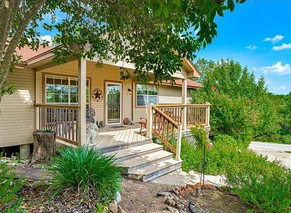 Enjoy the hill county vistas, sitting on the covered front porch.