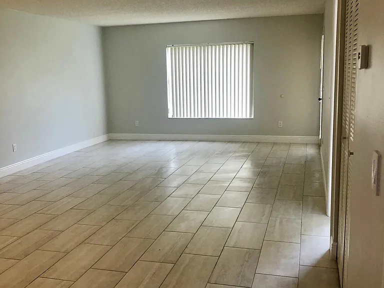 Entry hall looking into living room