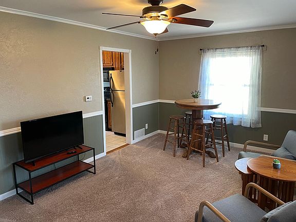 Living and dining area connected to the kitchen.