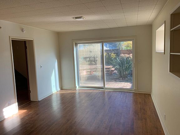 Sliding glass doors out to patio (door to left leads to kitchen)