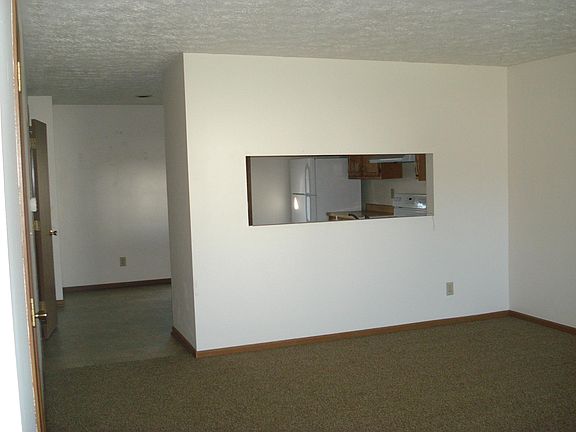 Dining area with pass through to kitchen.