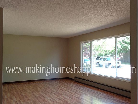 To the left of the entrance large front living space with la