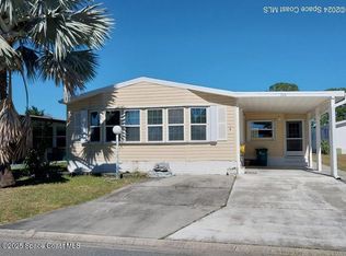 306 Papaya Cir, Barefoot Bay, FL 32976