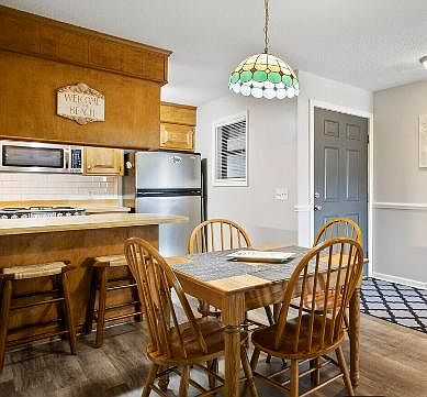 Dining area with barstool seating.