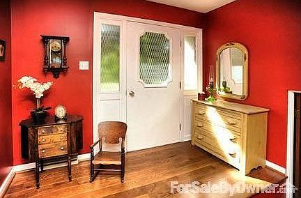 Front Foyer
						:
						Gleaming oak hardwood floors warmly greet your guests. Right is the family room.