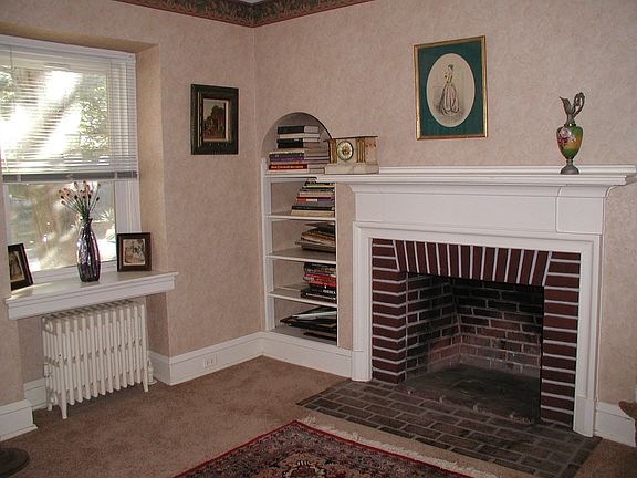 Brick Fireplace with charming built ins