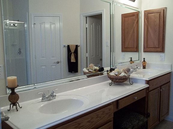 Large bath room has two sinks