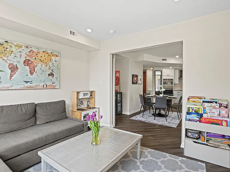 Versatile flex space perfect for a playroom, formal dining room, or a private guest bedroom, all featuring excellent natural light.