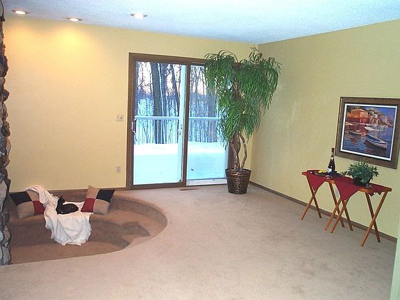 Conversation pit allows lounging before the fire on a cold night.