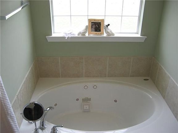 Master Bath with Tiled Shower and Jacuzzi Tub