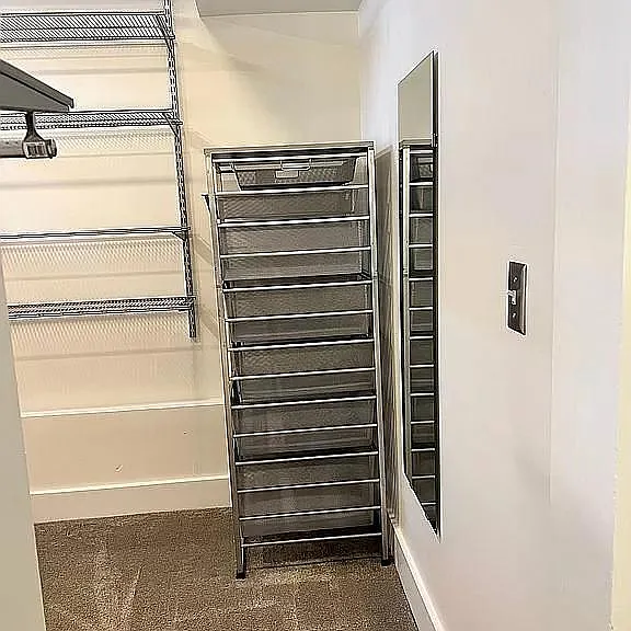 Shelving and storage cart included.