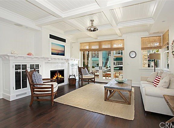Great room with French doors that open to an inviting front porch