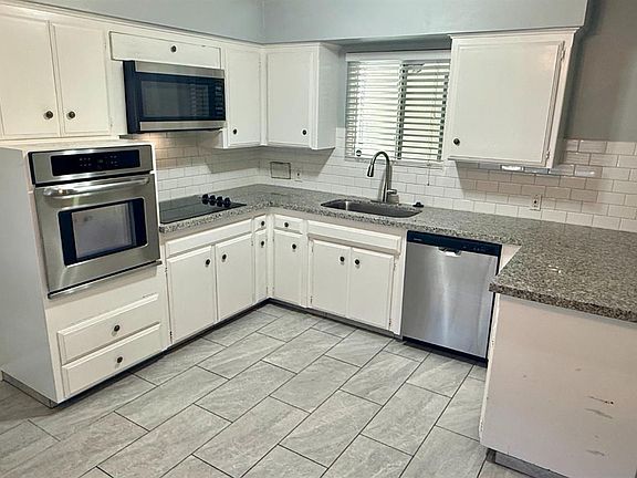 3rd image of 4829 E Santa Ana Ave