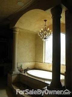 Master Bath/W Large Walk in Closet
						:
						2vanities (1 with sitting space), TV/ fireplace, 2 showr heads in Shower/Bench.