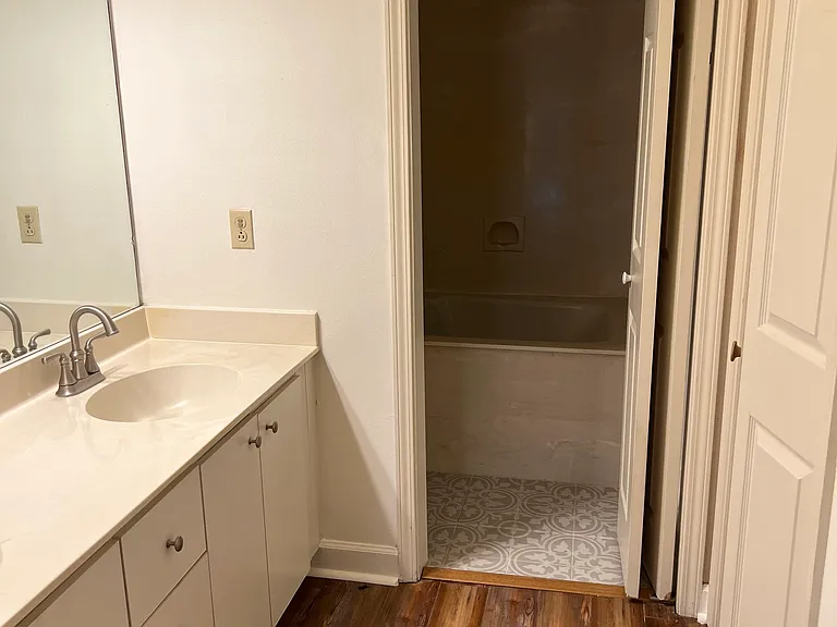 Master dressing room and bath. Full walk-in closet on right.