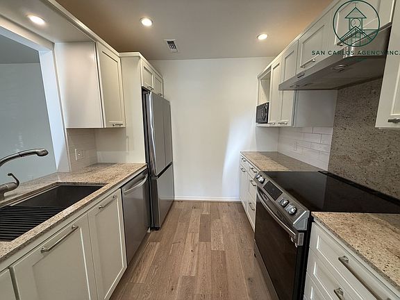 4th image of NE Corner San Carlos & 8th Unit 1