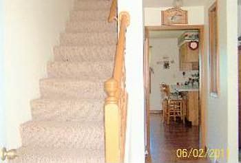 As you enter home through the front door up the stairs you go to two bedrooms and newly finished ful