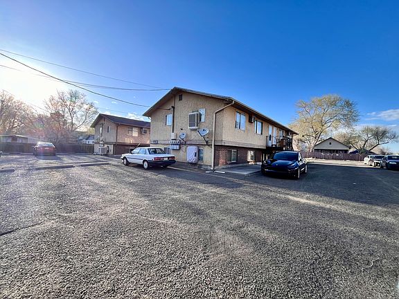 Exterior view with parking spots available.