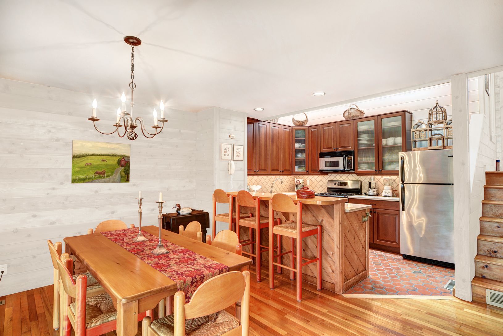  Dining Area and Kitchen; Color of Walls Digitally Altered