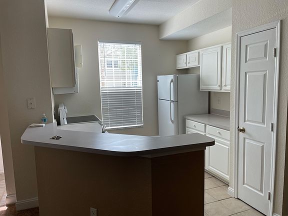 3rd image of 13700 Richmond Park Dr N APT 102