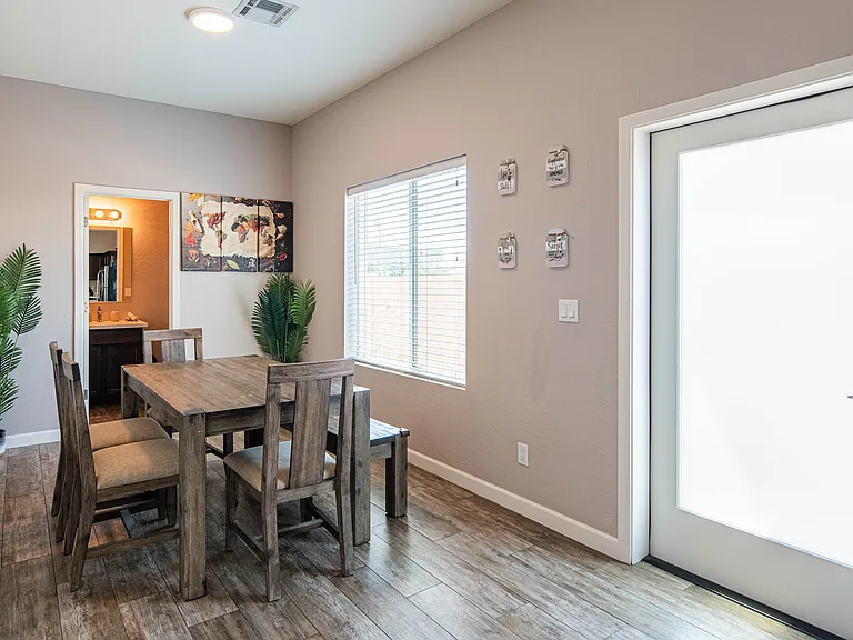 Dining area and back patio yard door
