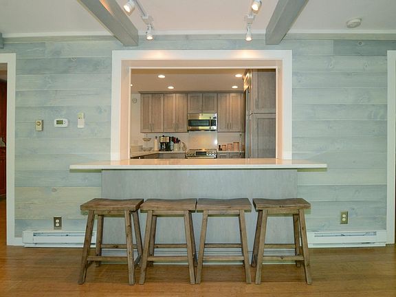 Breakfast bar in the sitting room allows for talking with the cook!