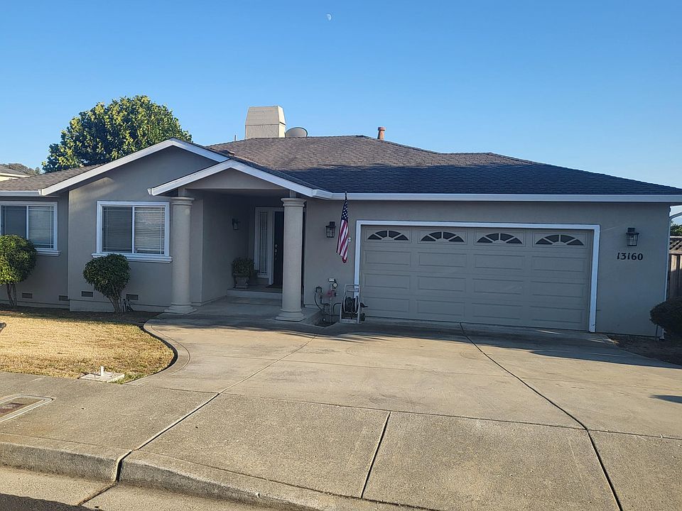 front yard, 2 car garage..Plenty of parking on street.