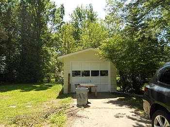 Separate garage on the east end of the property can be for landlord's storageworkshop etc.  Duplex sits on a large lot 231' frontage by 102 deep.