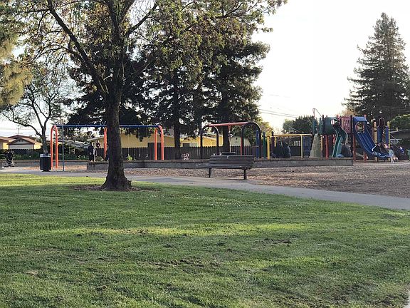 Next to the public park and public library