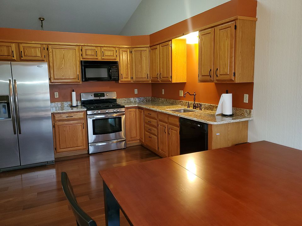 Kitchen with granite countertops.