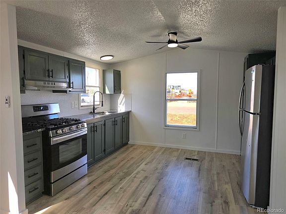 5th image of 10110 E 120th Avenue LOT 2
