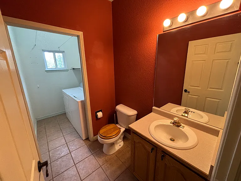 Main floor half-bath and laundry room