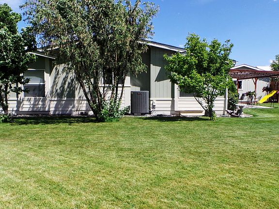Back yard has mature trees