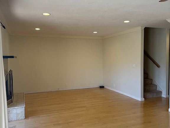 Family Room / Living Room with access to the front balcony overlooking the hills.