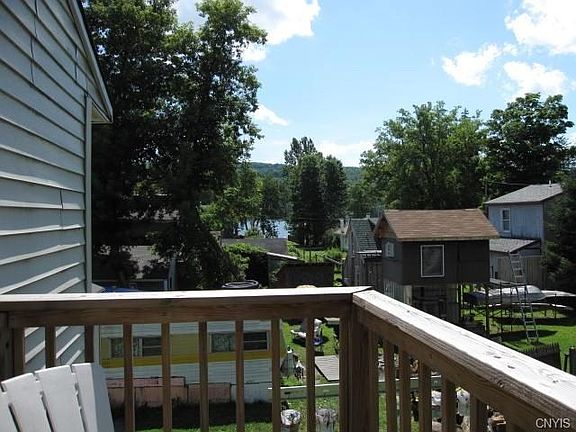 The view from the upstairs balcony.  You can see the lake through the trees - even better in winter!