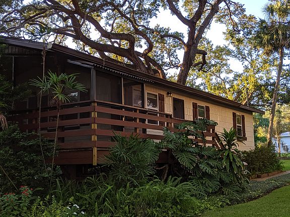 Front screened porch & east side