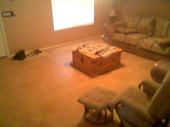 16" X 16" Tile floor in the Living Room and Family room