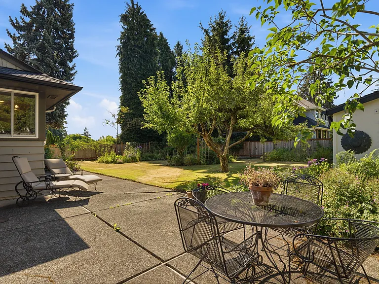 Outdoor eating area and spacious yard