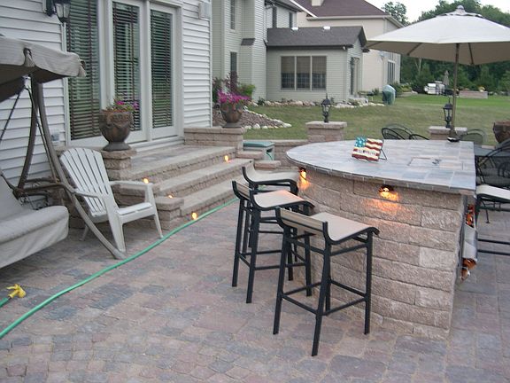 Huge brick patio with built in wet bar