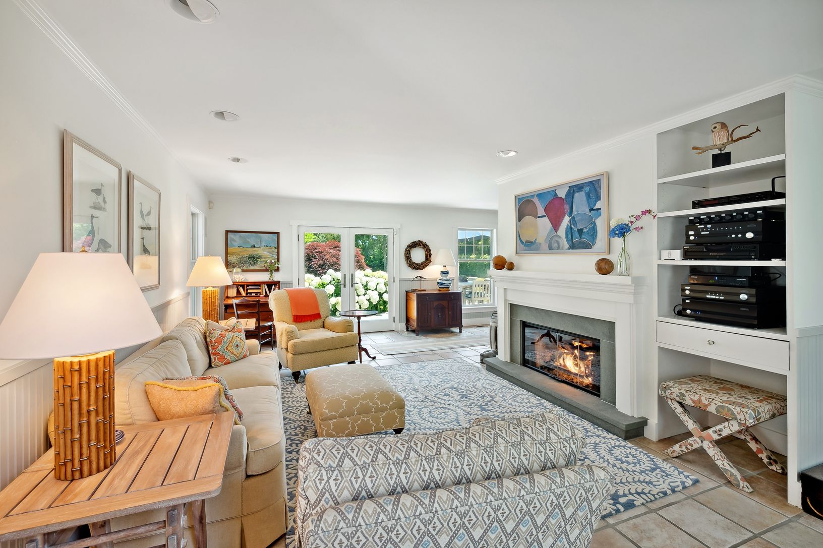 Living room gas fireplace and LG “Frame” TV. Choose your favorite online hi-res art to display