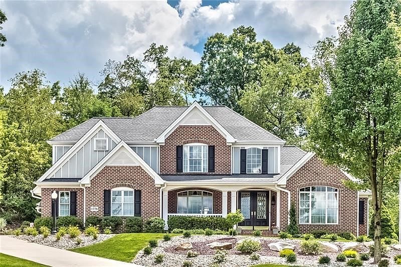 This four bedroom two story residence built by Hendolhurst Homes Inc. is a tour de force of luxury, privacy and comfort in Adams