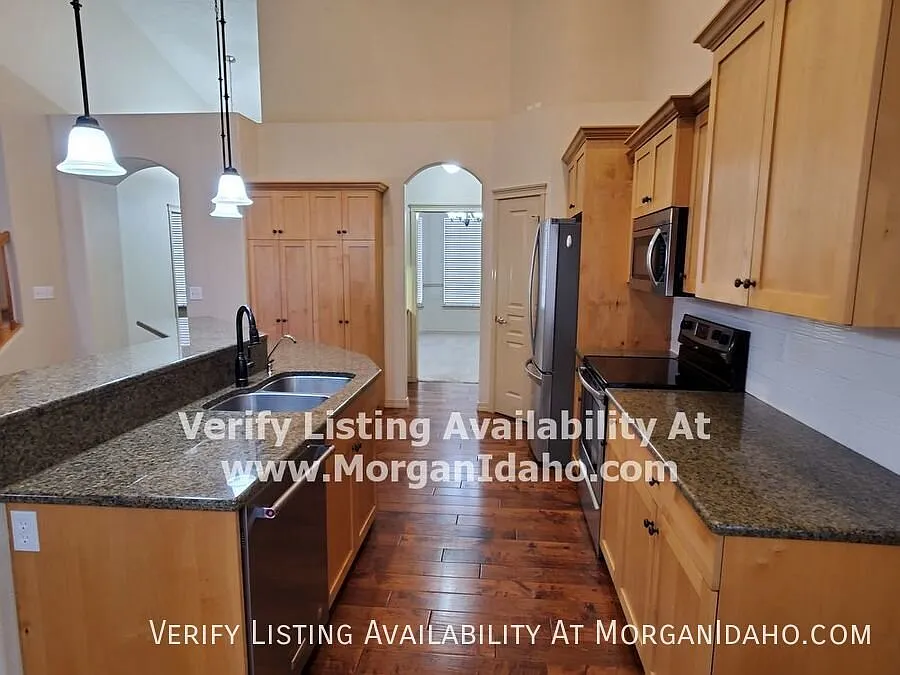 Large garage, extended covered patio, and many more premium features! — Photo 4