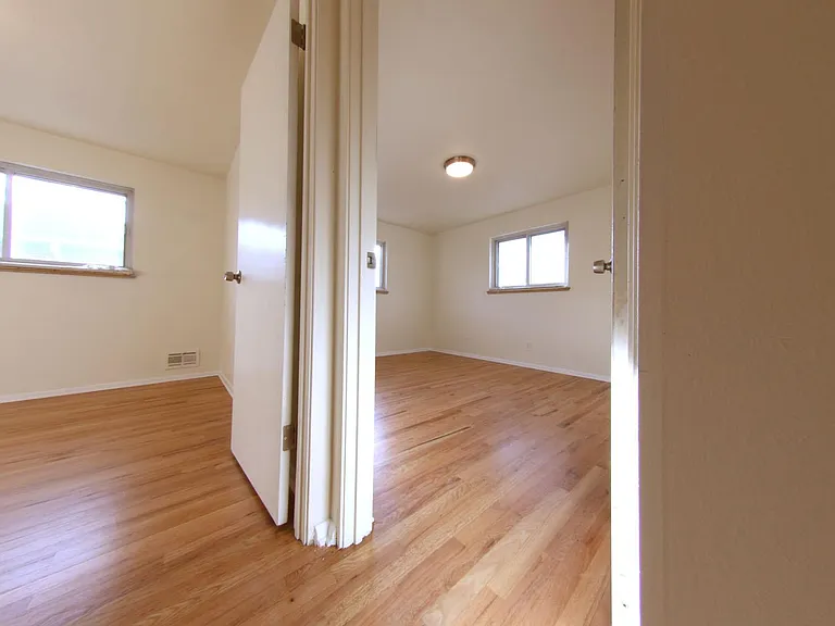 Looking into bedroom/office on left and master bedroom on right