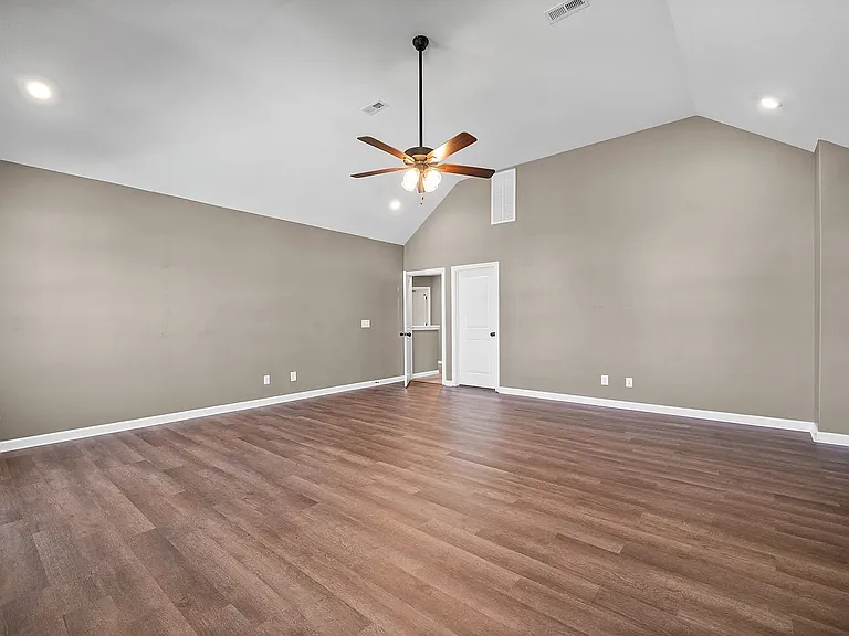 Large Bonus Room 19'x21'. Previously used as a combo space for playroom, office, and guest bedroom. Does have a large walkin closet.